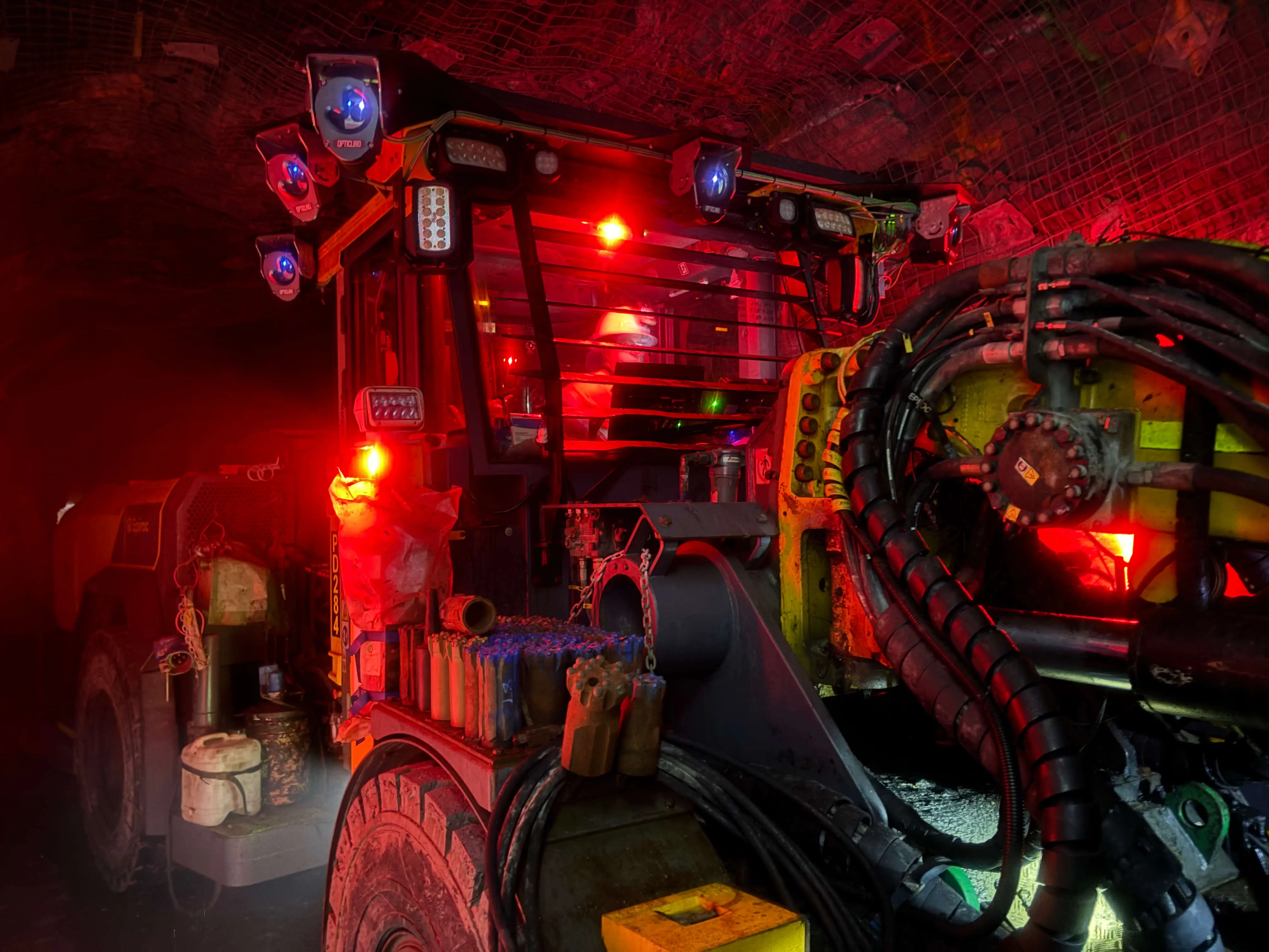Camera-based drill rig alignment and positioning system for underground longhole mining.